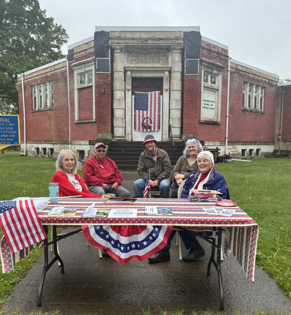 Mary, Tom, Bill, Bill’s wife Liz, and Gail, tabling during the 2026 Memorial Day parade